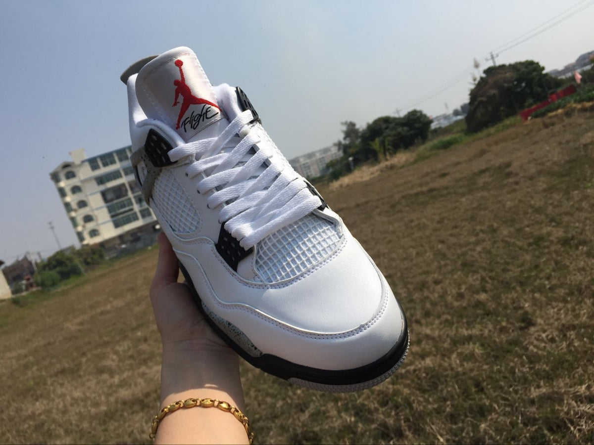 Men's Jordan 4 Retro White Cement Sneakers - product image from the listing.