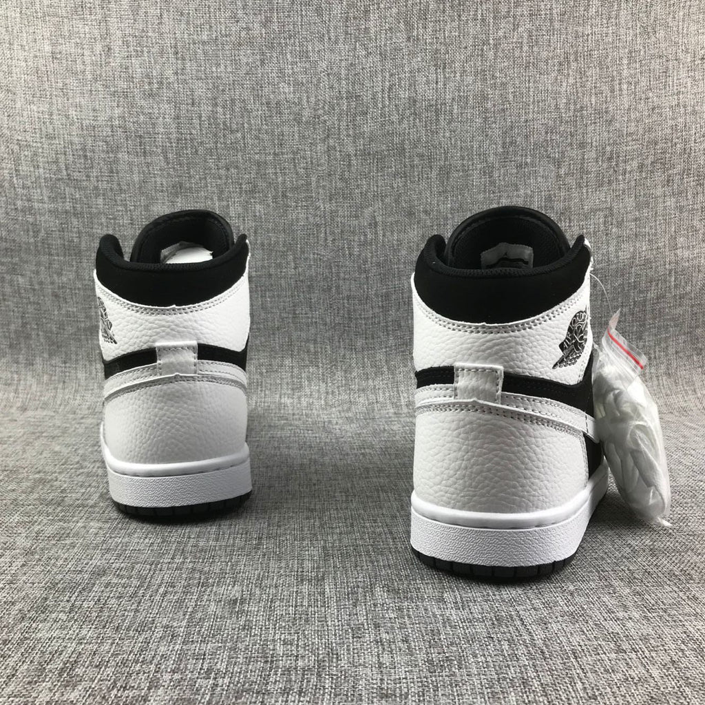 Air Jordan 1 High Sneakers in Black and White 554724-113 - product image from the listing.