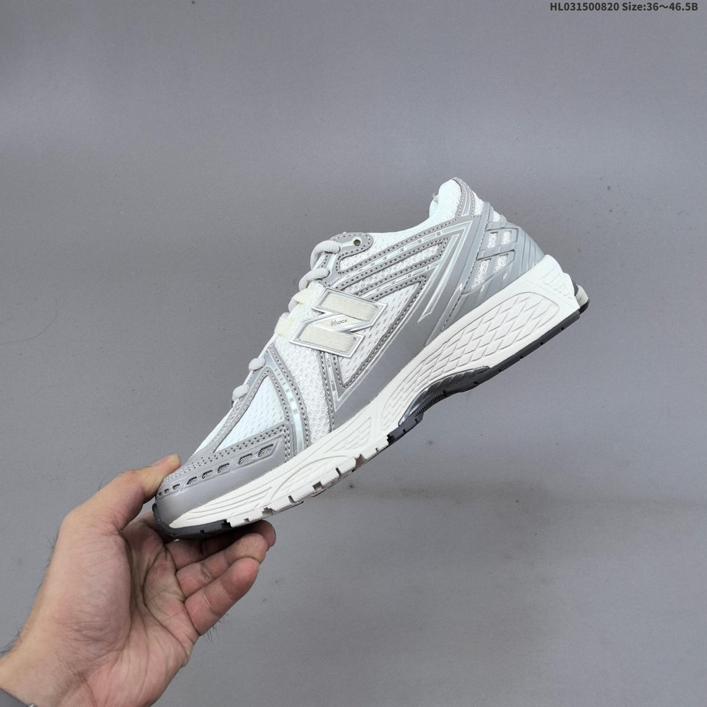 New Balance 1906R Sneakers in White Silver U1906RJM - product image from the listing.