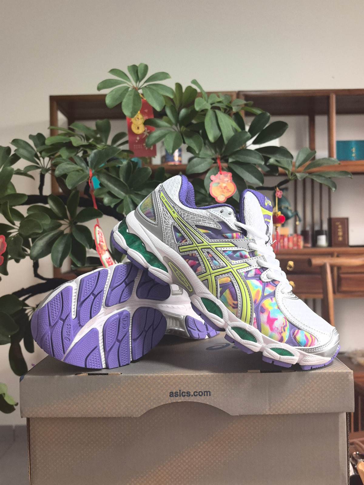 ASICS GEL-Nimbus 16 Running Shoes in White Purple - product image from the listing.