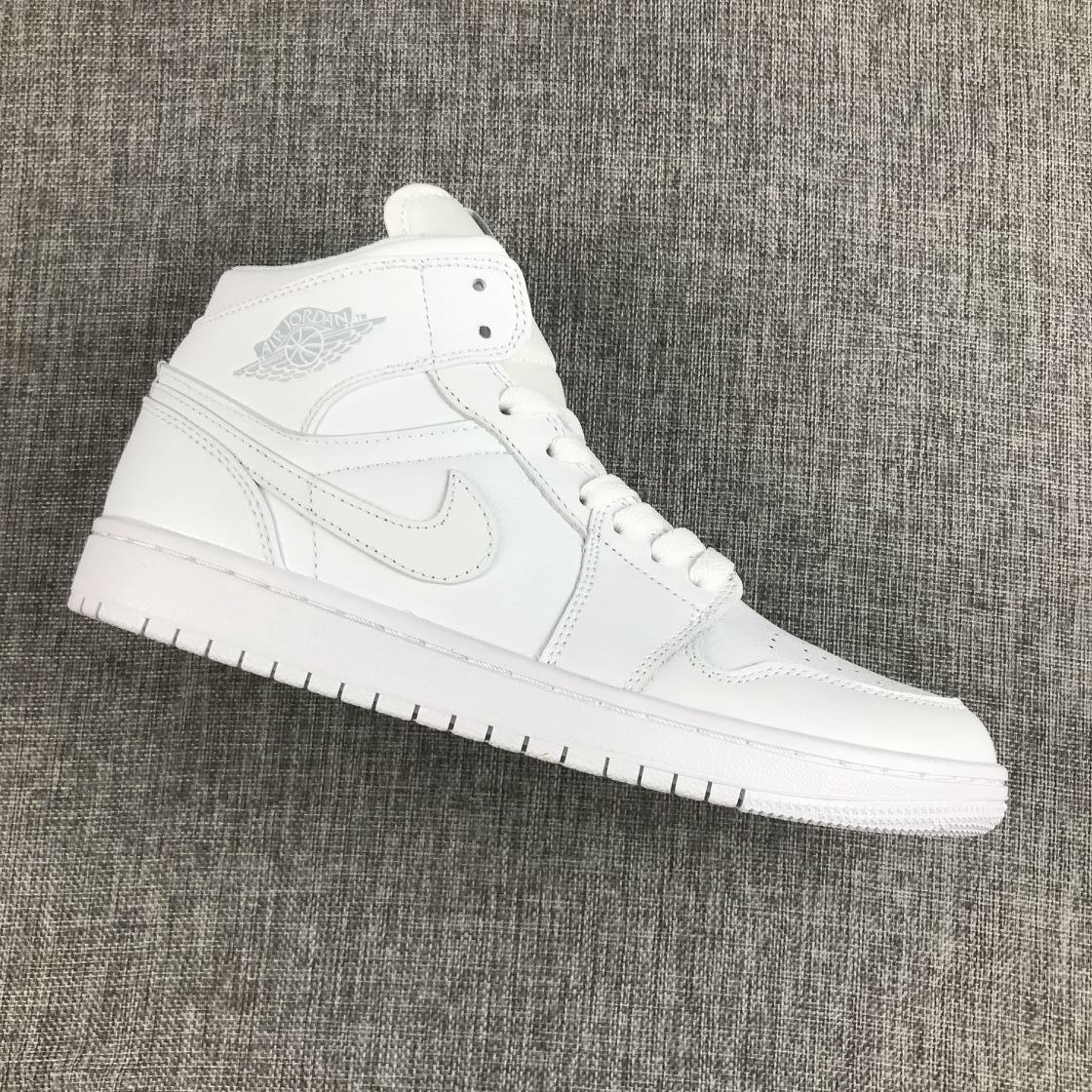 Air Jordan 1 Mid Sneakers in White - product image from the listing.