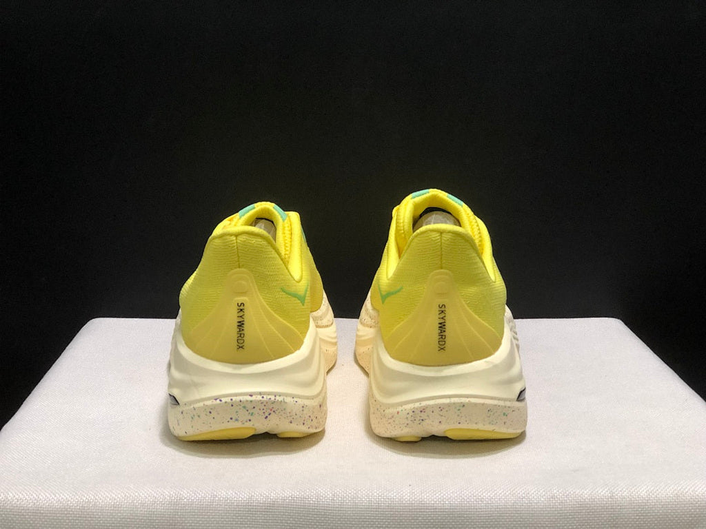 Yellow and Aqua HOKA Skyward X Running Shoes - product image from the listing.