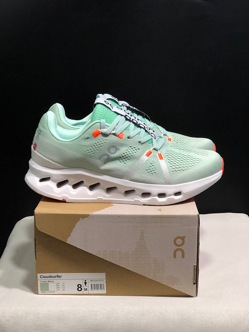 Pale Green and White On Cloudsurfer Sneakers - product image from the listing.