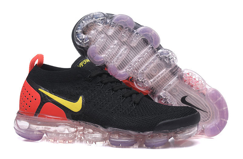 Nike Air VaporMax Flyknit 2 Sneakers in Black and Yellow - product image from the listing.