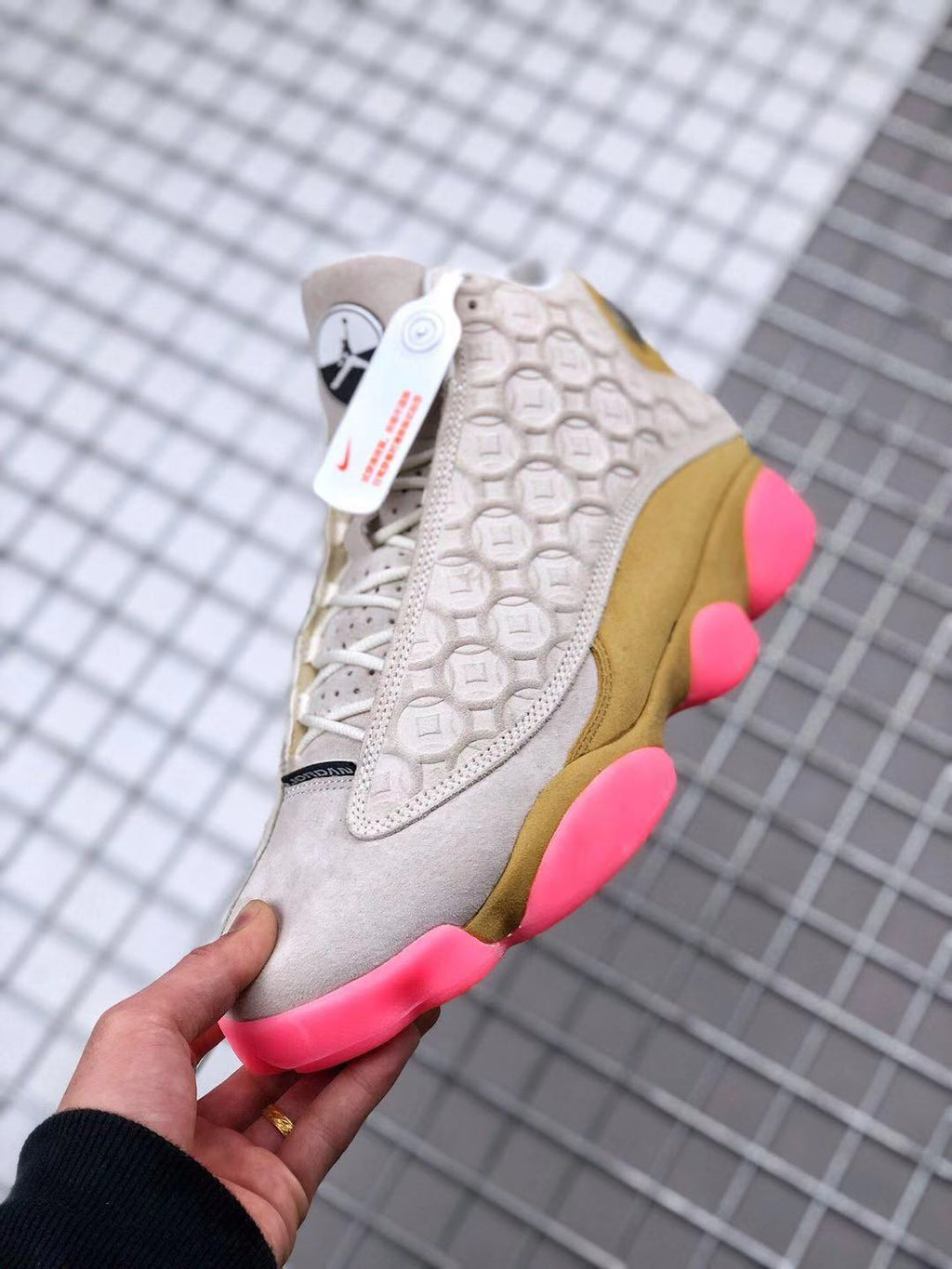 Air Jordan 13 CNY Sneakers in White, in Gold and Pink - product image from the listing.