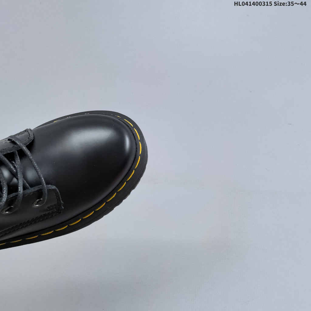 Black Platform Lace-Up Ankle Boots by Dr. Martens - product image from the listing.