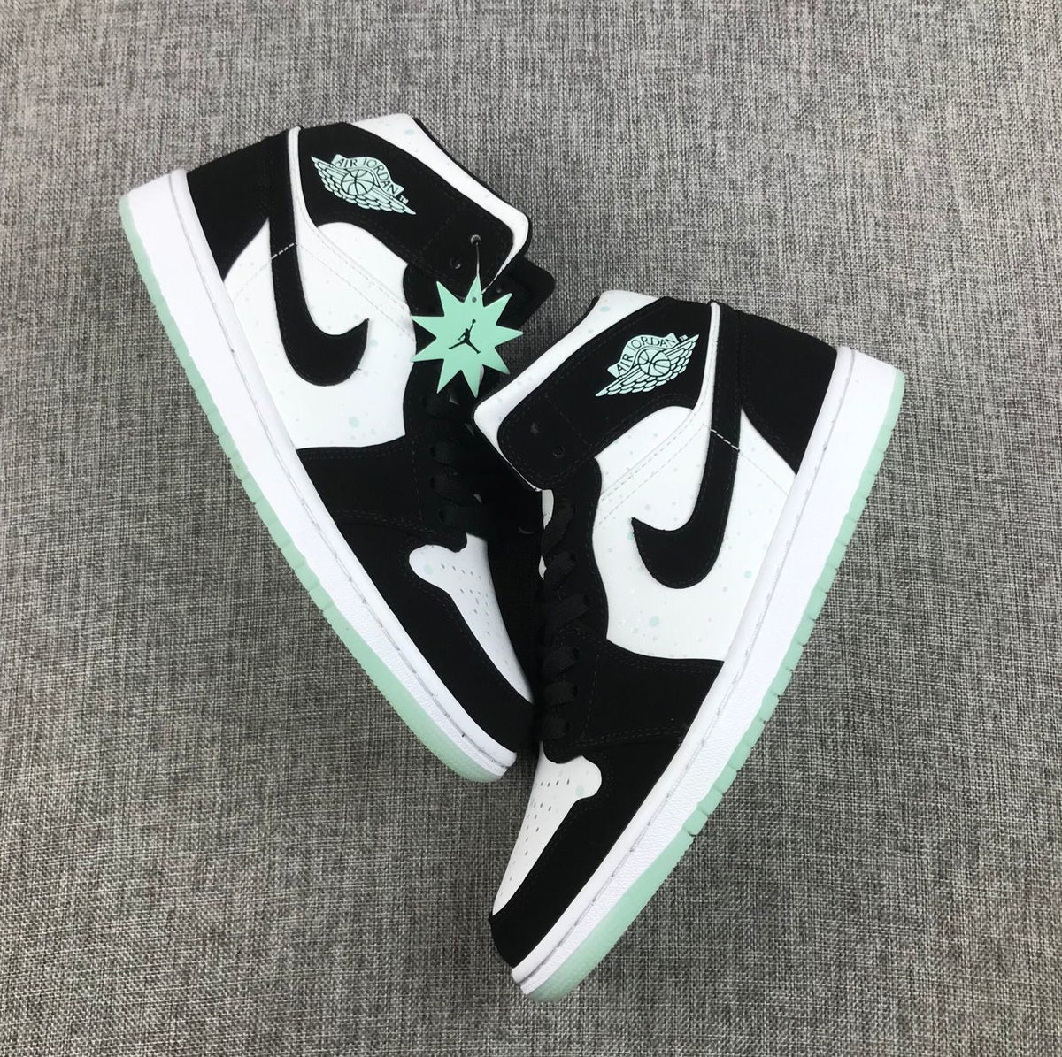 Air Jordan 1 Mid Sneakers in Black White Mint BQ6931-103 - product image from the listing.