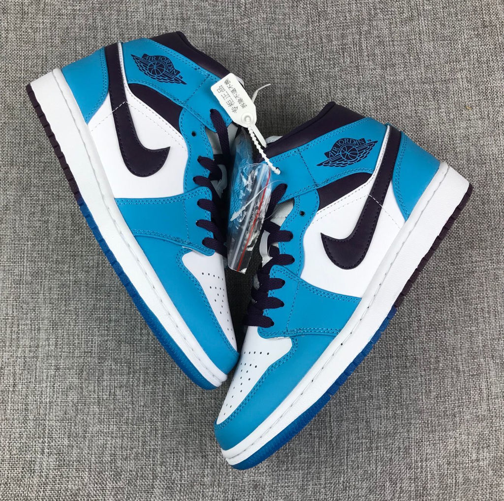 Air Jordan 1 Mid Sneakers in Blue, in White and Black - product image from the listing.