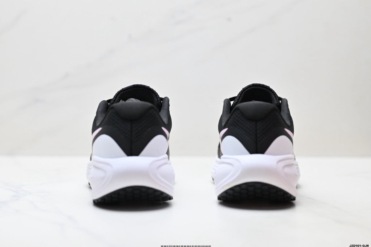 Nike Revolution 8 Running Shoes in Black and Pink - product image from the listing.