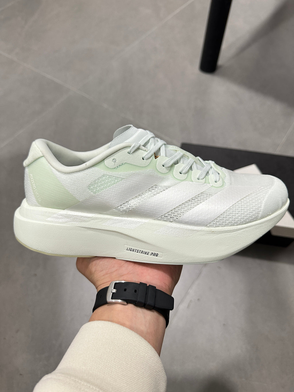 adidas Lightstrike Pro Running Shoes in White Green JR5840 - product image from the listing.