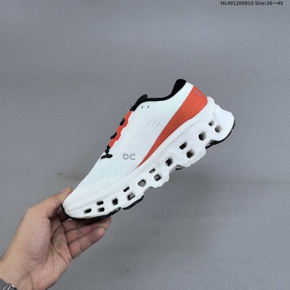 On Cloudmonster 3 Hyper Running Shoes in White Orange - product image from the listing.
