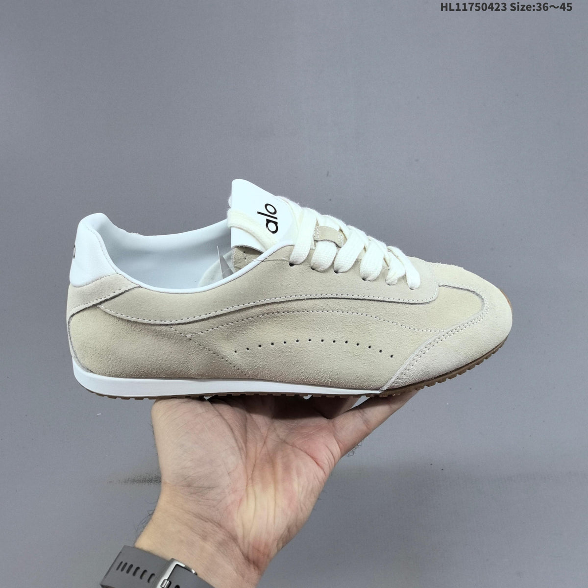 Black and Ivory Alo Yoga Sunset Sneaker - product image from the listing.