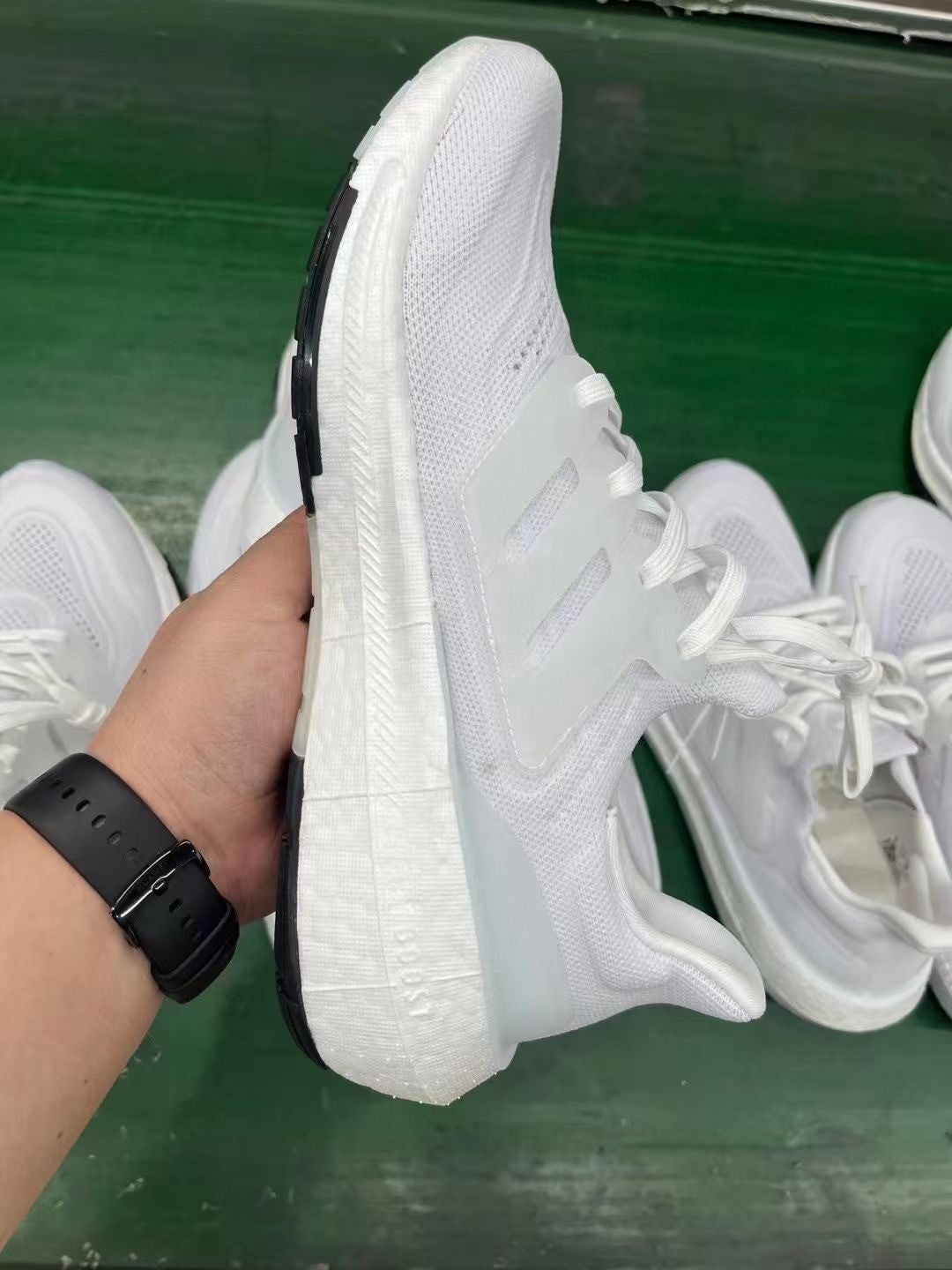 adidas Ultraboost 23 Light Running Shoes, in White and Black GY9350 - product image from the listing.