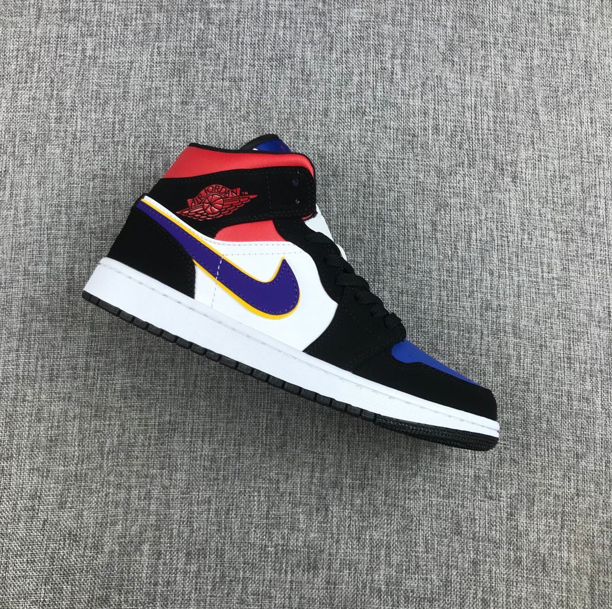 Air Jordan 1 Mid What The Sneakers in Multicolor 852542-005 - product image from the listing.