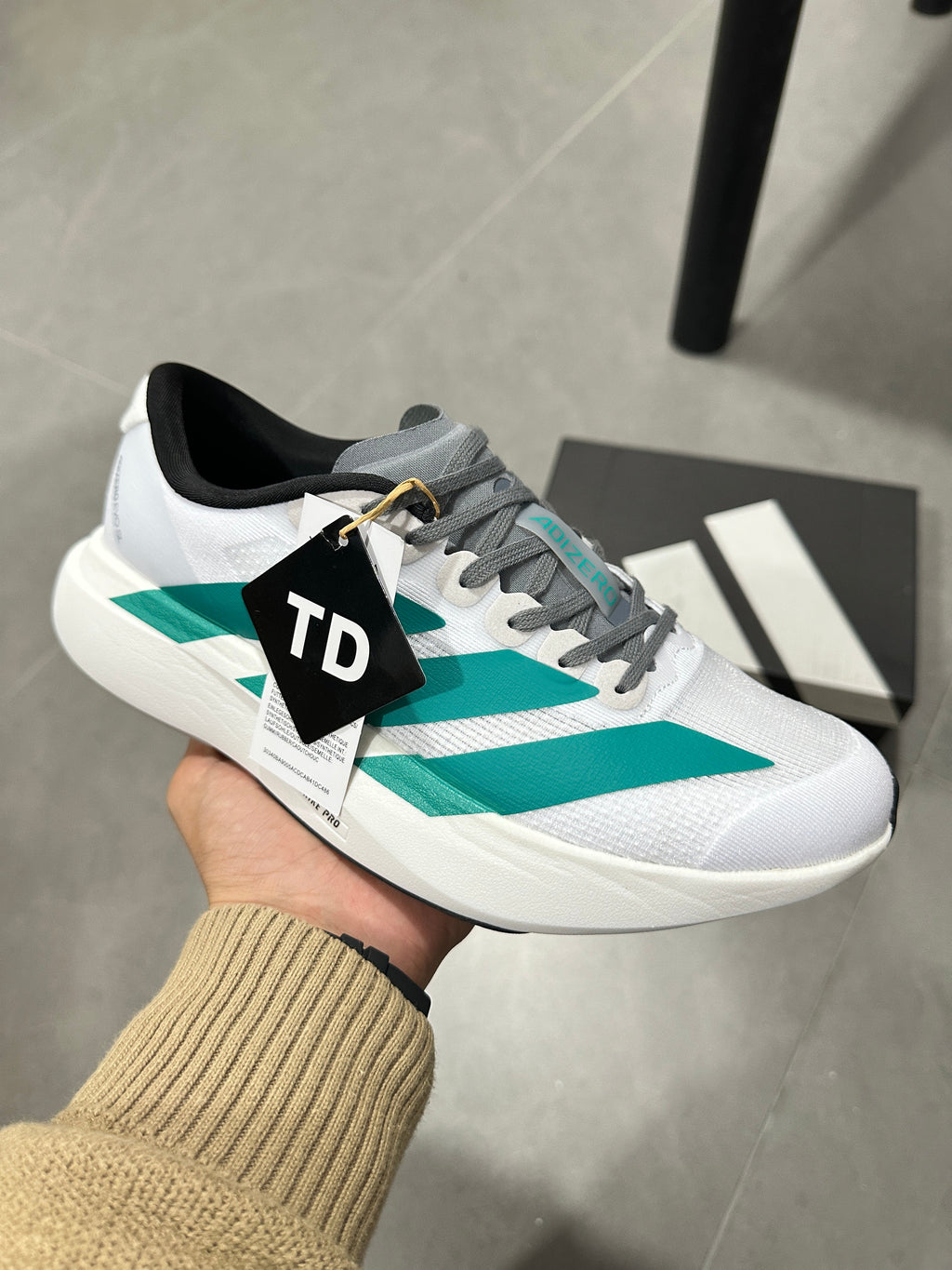 Adidas Lightstrike Pro Running Shoes in White Teal - product image from the listing.