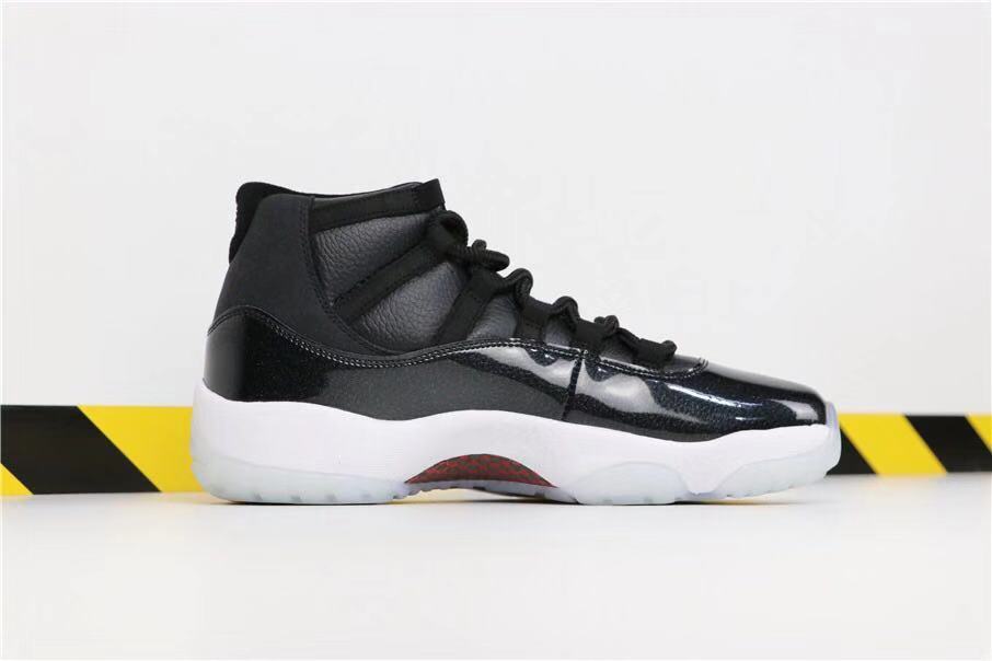 Air Jordan 11 Retro 72-10 High-Top Sneakers in Black and White - product image from the listing.
