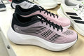 Black Sneakers in and Purple - product image from the listing.