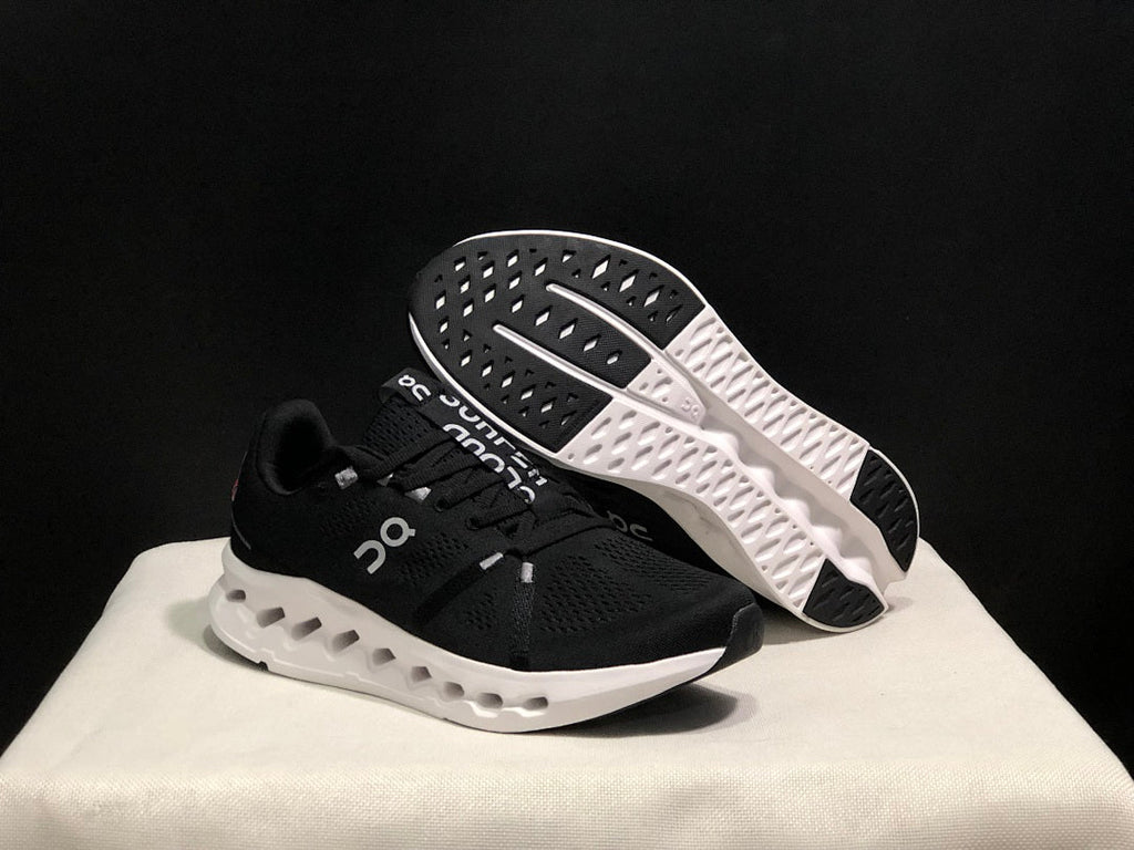 On Cloudsurfer Running Shoes in Black and White - product image from the listing.