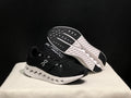 On Cloudsurfer Running Shoes in Black and White - product image from the listing.