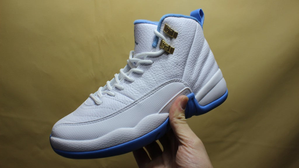 Air Jordan 12 High-Top Sneakers in University Blue 510815-127 - product image from the listing.