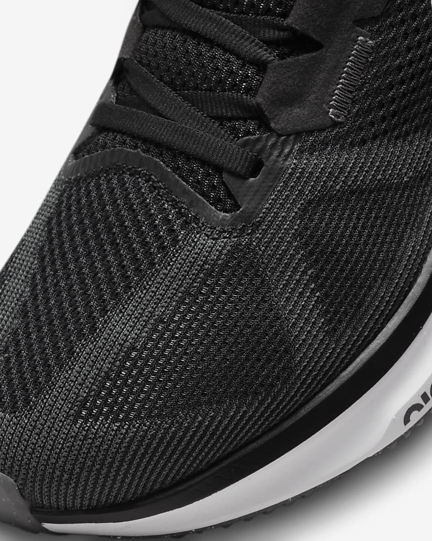 Nike Structure 25 Road Running Shoes in Black DJ7883-002 - product image from the listing.