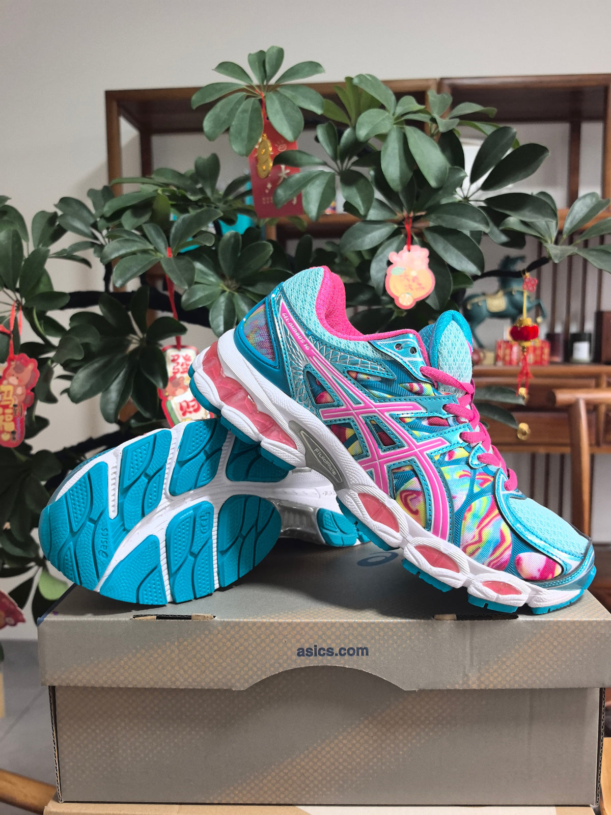 ASICS GEL-Nimbus 16 Sneakers in Pink, in Green and Blue - product image from the listing.