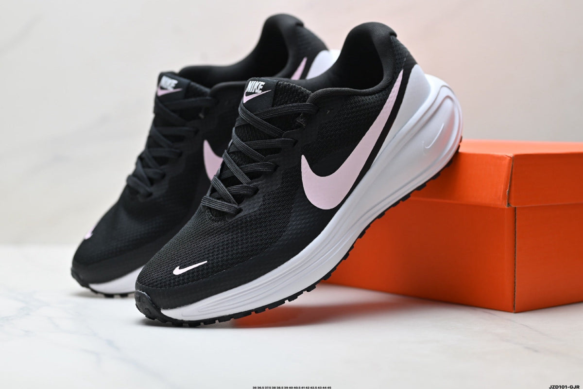 Nike Revolution 8 Running Shoes in Black and Pink - product image from the listing.