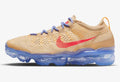 Tan and Blue Nike Air VaporMax Flyknit Sneakers - product image from the listing.