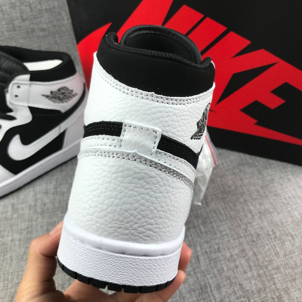 Air Jordan 1 High Sneakers in Black and White 554724-113 - product image from the listing.