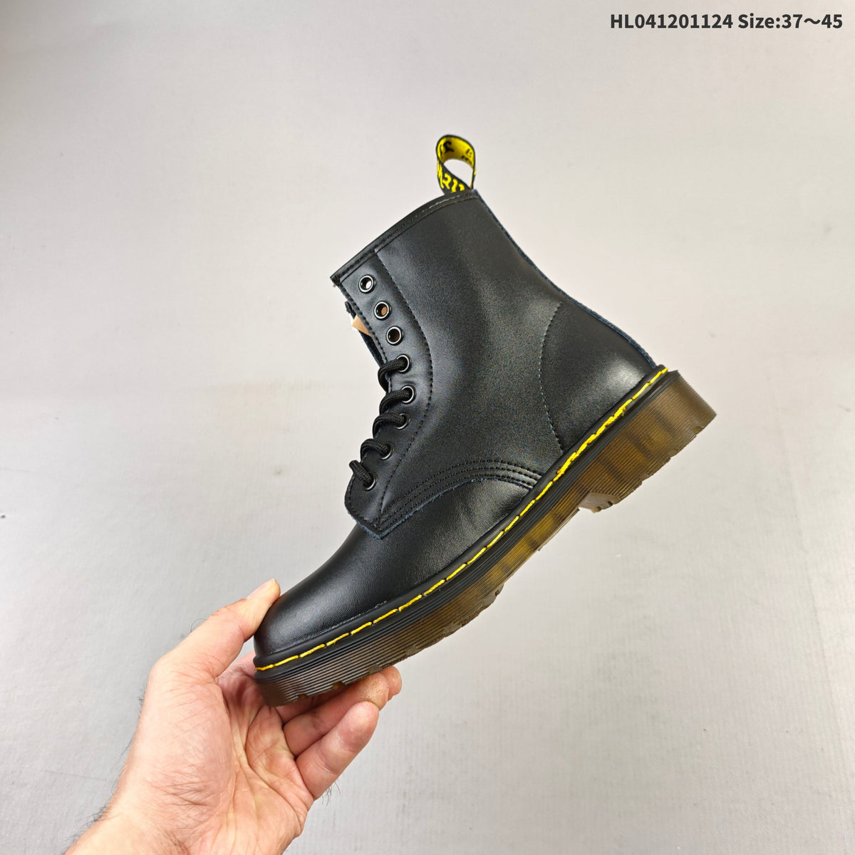 1460 Smooth Black Platform Lace-Up Boots by Dr. Martens - product image from the listing.