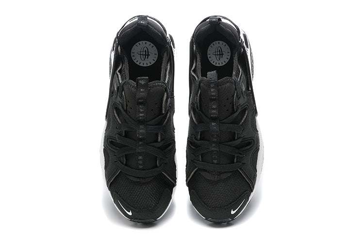 Nike Air Huarache Sneakers in Black and White - product image from the listing.