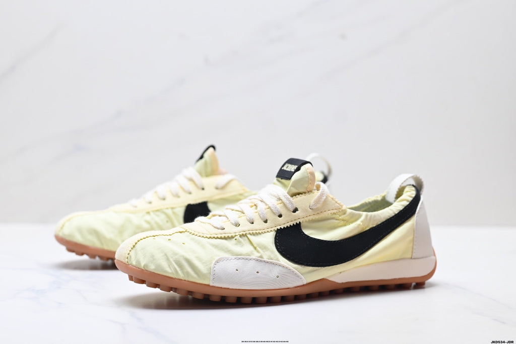Pale Yellow and Black Nike x Jacquemus Sneakers - product image from the listing.