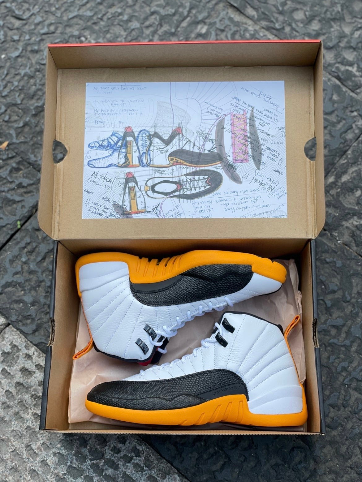 Air Jordan 12 25 Years in China White Black Yellow DR8887-100 - product image from the listing.