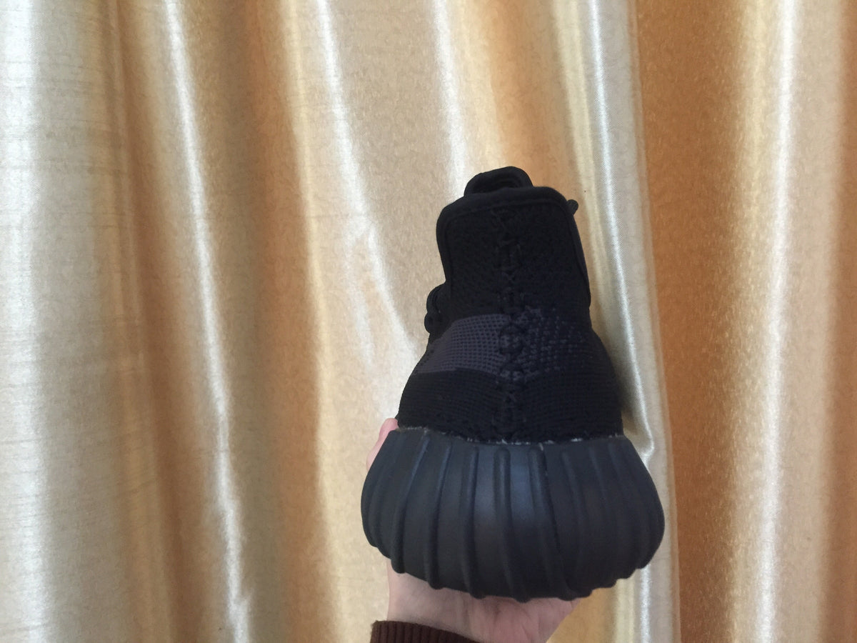 Adidas Yeezy Boost 350 V2 Sneakers in Black Knit - product image from the listing.