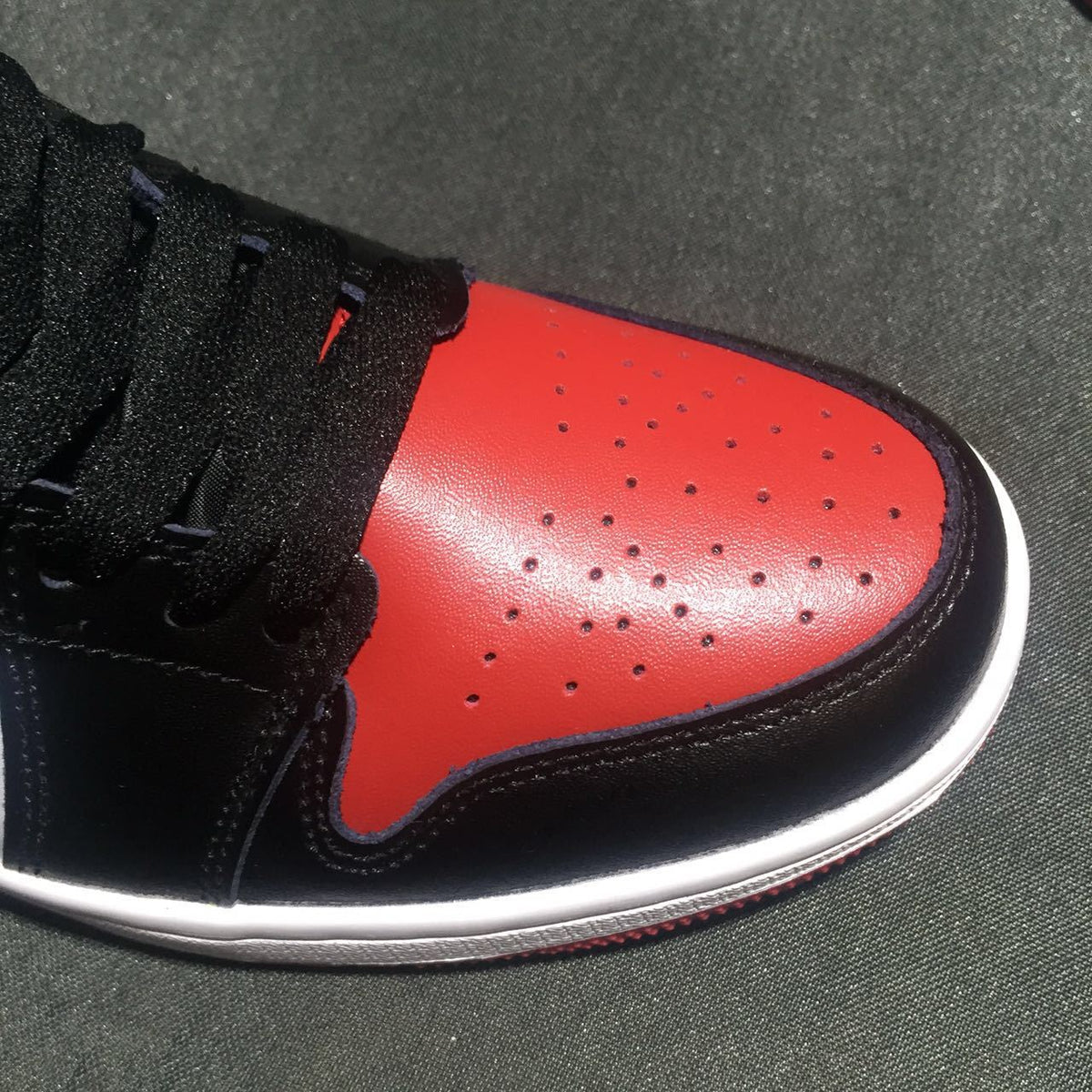 Jordan 1 High Three-Color Sneaker in Black, in Blue and Red - product image from the listing.