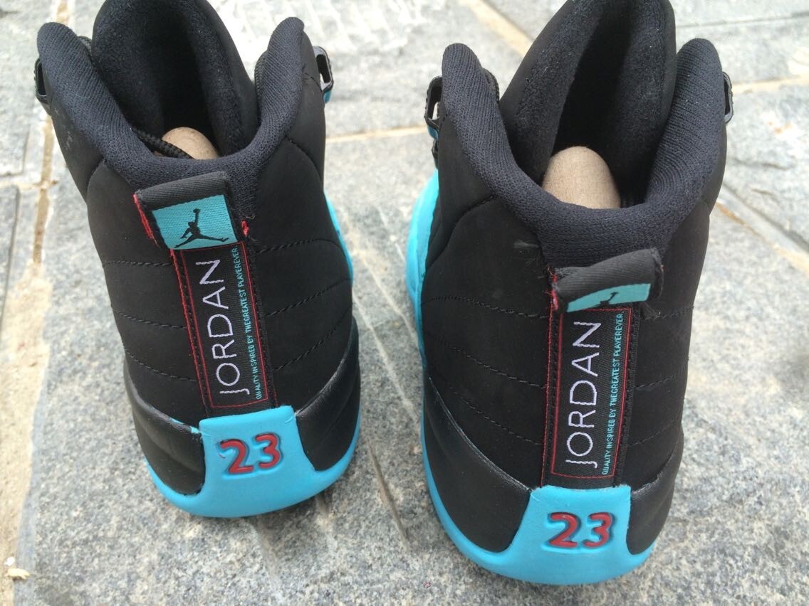 Women's Air Jordan 12 High-Top Sneakers, Black and White - product image from the listing.