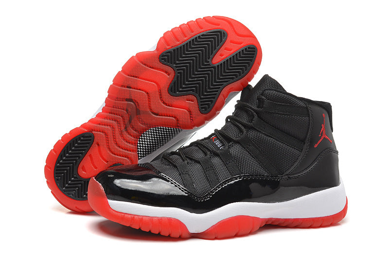 Air Jordan 11 Retro High Basketball Sneakers in Black Red - product image from the listing.