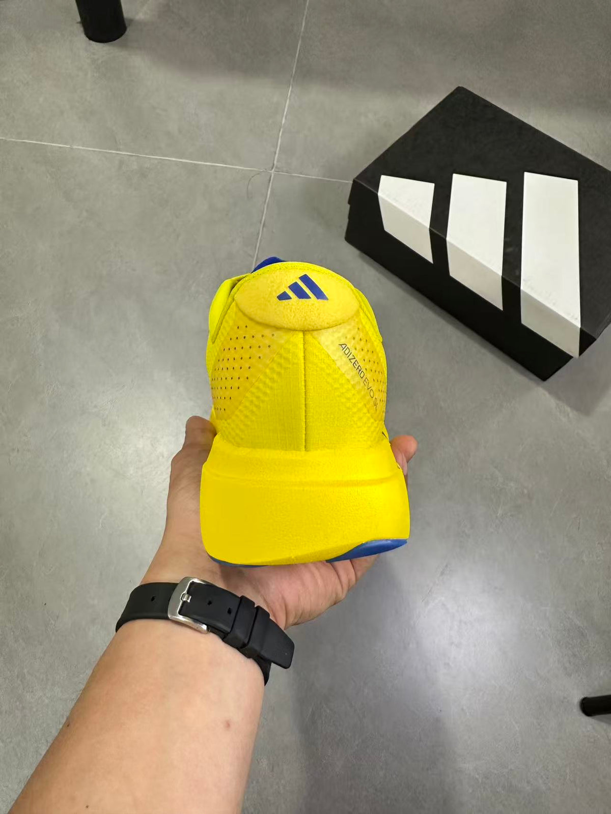 Adidas Lightstrike Pro Running Shoes, in Yellow and Blue - product image from the listing.