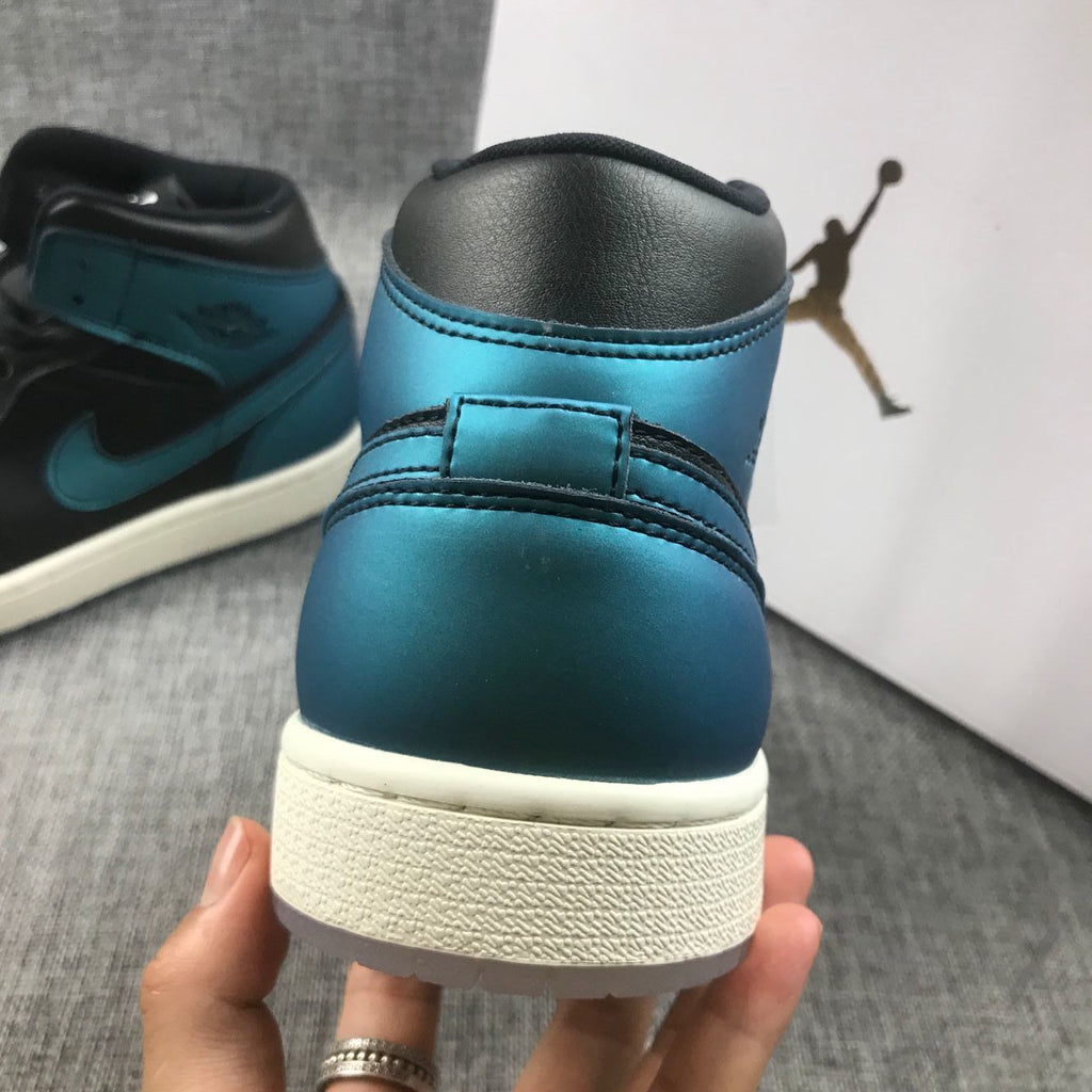 Air Jordan 1 Mid BQ6472-009 Sneakers in Black and Turquoise - product image from the listing.
