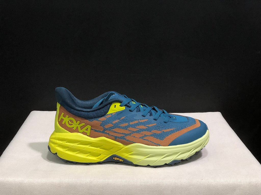 HOKA Speedgoat 6 Trail Running Shoes in Blue Yellow - product image from the listing.