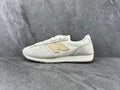 Cream and Beige New Balance Low-Top Sneakers - product image from the listing.